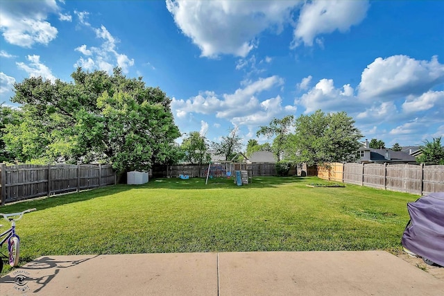 5692 W Roosevelt St, Monee, IL 60449 - fenced backyard featuring a playground