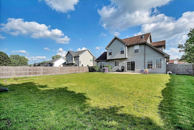 5692 W Roosevelt St, Monee, IL 60449 - rear view of property featuring a fenced backyard and a patio area