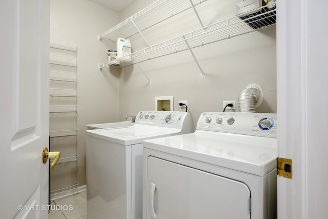 800 Weidner Rd Unit 307, Buffalo Grove, IL 60089 - laundry room with washer and dryer and light tile patterned floors