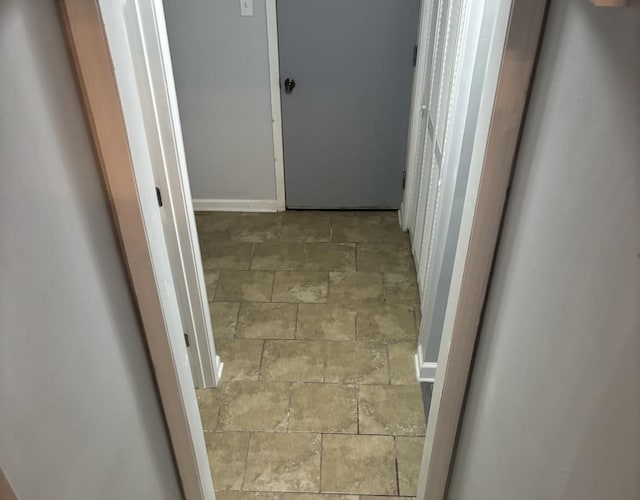 3501 Fountainbleau Dr, Hazel Crest, IL 60429 - hallway with stone tile floors and baseboards