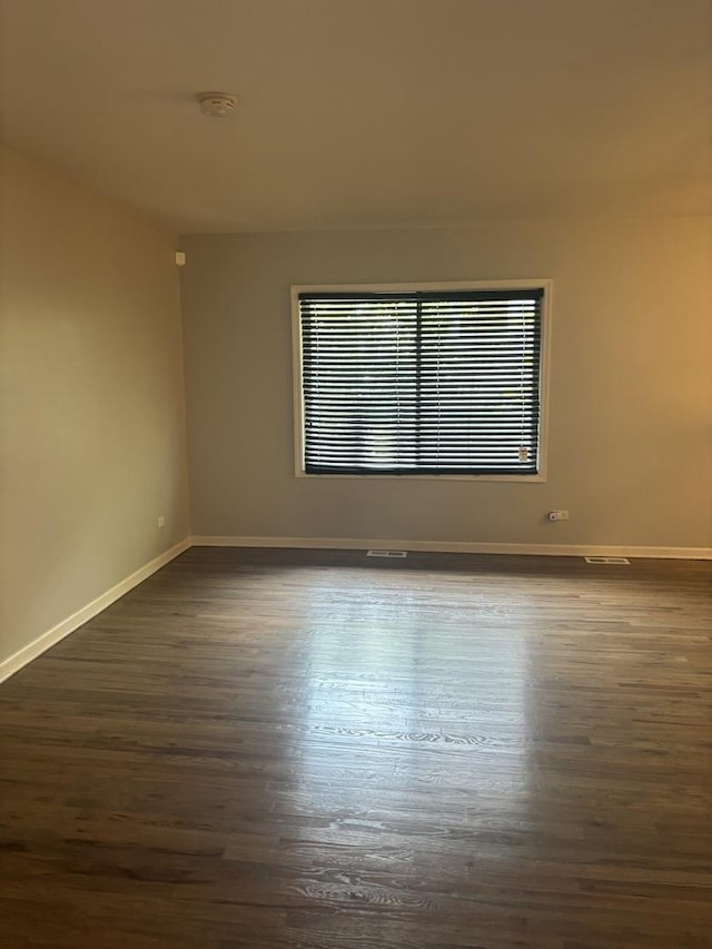 3501 Fountainbleau Dr, Hazel Crest, IL 60429 - empty room featuring dark wood finished floors and a smoke detector