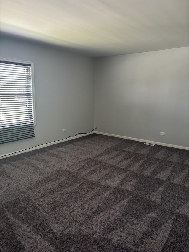 3501 Fountainbleau Dr, Hazel Crest, IL 60429 - spare room with dark colored carpet