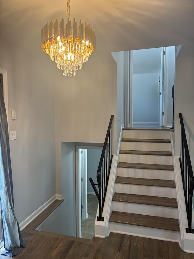 3501 Fountainbleau Dr, Hazel Crest, IL 60429 - stairway featuring a chandelier and wood finished floors