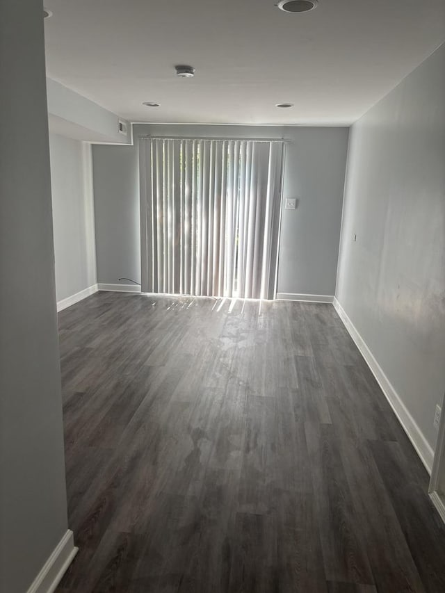 3501 Fountainbleau Dr, Hazel Crest, IL 60429 - empty room with dark wood-style floors and a smoke detector