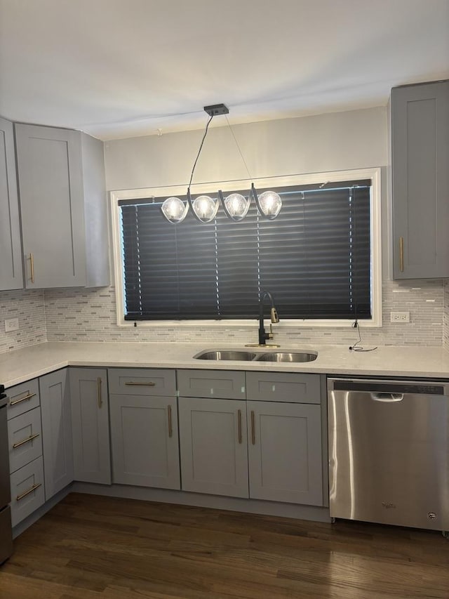 3501 Fountainbleau Dr, Hazel Crest, IL 60429 - kitchen with dishwasher, gray cabinetry, tasteful backsplash, dark wood-type flooring, and light countertops