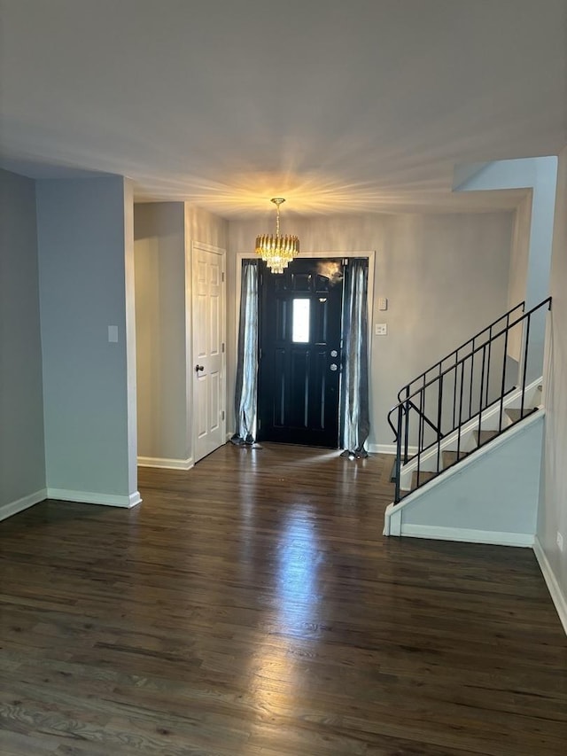 3501 Fountainbleau Dr, Hazel Crest, IL 60429 - foyer entrance featuring a chandelier, dark wood-style floors, and stairway