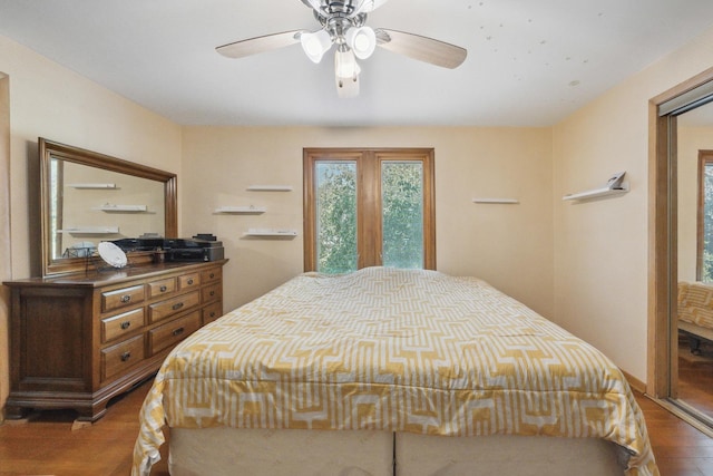 715 N 4th St, Dekalb, IL 60115 - bedroom with wood finished floors and a ceiling fan
