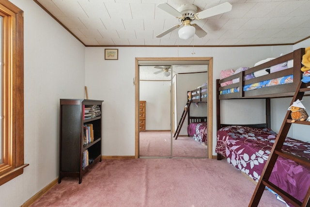 715 N 4th St, Dekalb, IL 60115 - carpeted bedroom with crown molding and ceiling fan