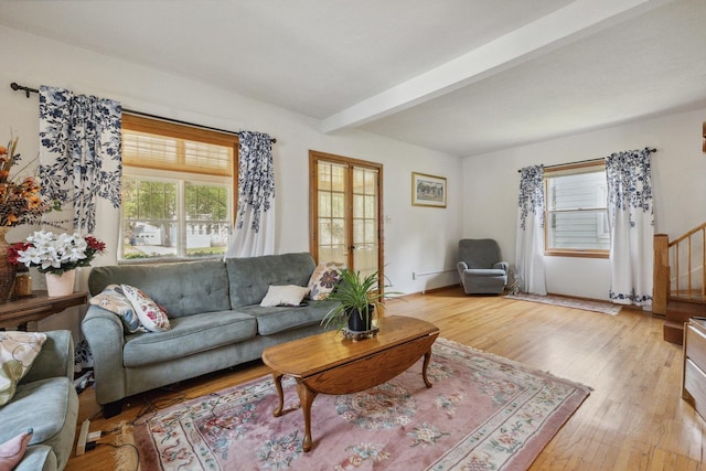 715 N 4th St, Dekalb, IL 60115 - living room with beam ceiling and light wood-style flooring