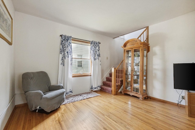715 N 4th St, Dekalb, IL 60115 - sitting room with wood finished floors and stairs