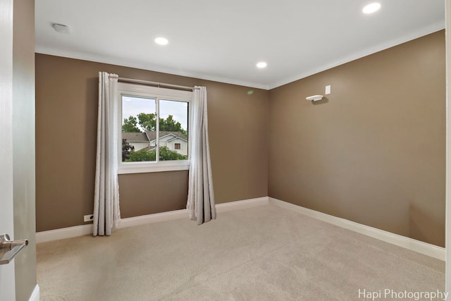 627 Bayview Pt, Schaumburg, IL 60194 - spare room featuring carpet, recessed lighting, a smoke detector, and crown molding