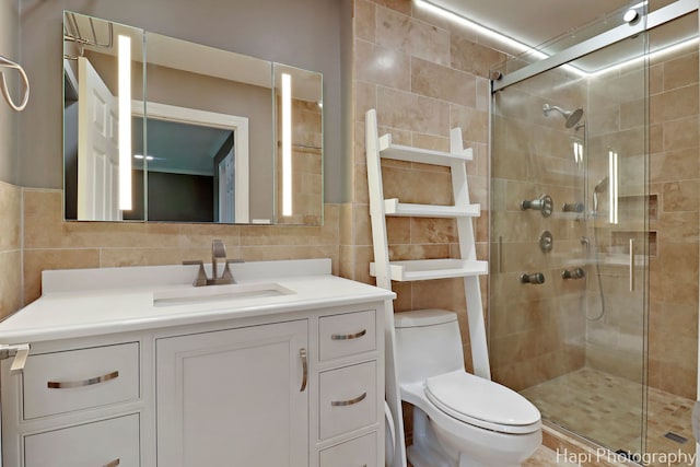 627 Bayview Pt, Schaumburg, IL 60194 - bathroom with tile walls, a shower stall, and vanity