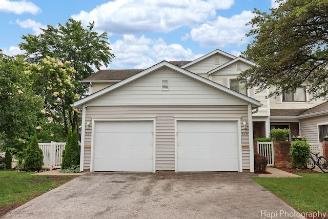627 Bayview Pt, Schaumburg, IL 60194 - traditional-style home with asphalt driveway and an attached garage