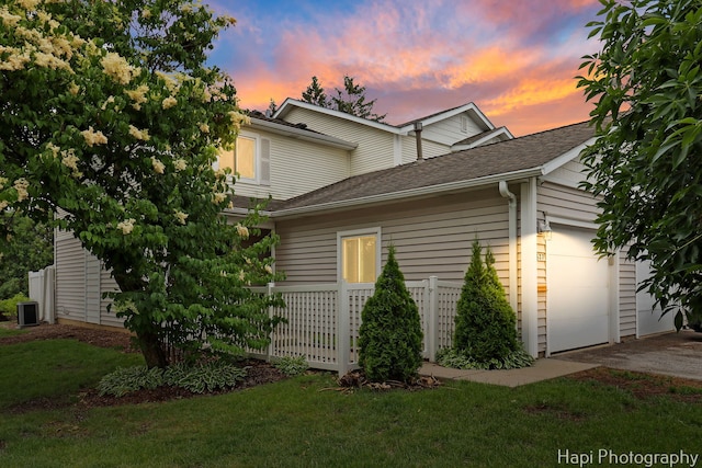 627 Bayview Pt, Schaumburg, IL 60194 - view of home's exterior featuring an attached garage, driveway, and a shingled roof