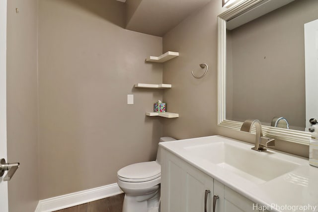 627 Bayview Pt, Schaumburg, IL 60194 - half bathroom with wood finished floors and vanity