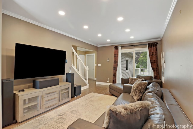 627 Bayview Pt, Schaumburg, IL 60194 - living area featuring light wood finished floors, ornamental molding, stairway, and recessed lighting
