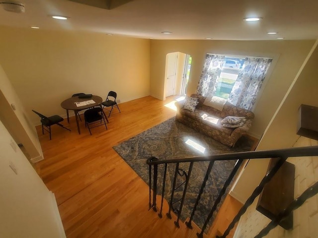 920 Hannah Ave, Forest Park, IL 60130 - living room with light wood finished floors, arched walkways, and recessed lighting