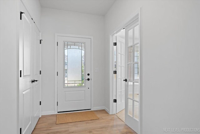 2308 Lawlor Ln, Naperville, IL 60564 - foyer featuring light wood finished floors and baseboards