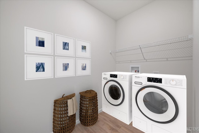 2308 Lawlor Ln, Naperville, IL 60564 - laundry area featuring washing machine and dryer and wood finished floors