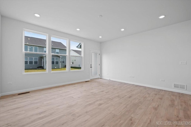 2308 Lawlor Ln, Naperville, IL 60564 - spare room with light wood finished floors and recessed lighting