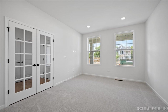 2308 Lawlor Ln, Naperville, IL 60564 - carpeted spare room featuring french doors and recessed lighting