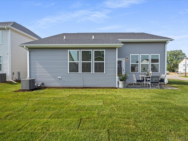 2308 Lawlor Ln, Naperville, IL 60564 - rear view of property with a patio, a lawn, and roof with shingles