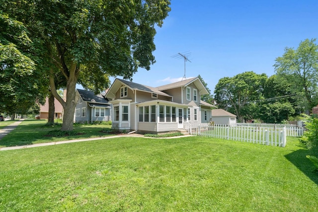 220 N Cedar St, Waterman, IL 60556 - rear view of house featuring a sunroom