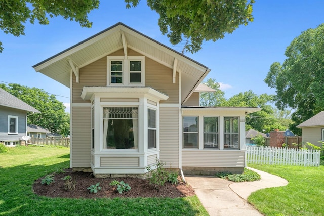 220 N Cedar St, Waterman, IL 60556 - view of front of property with a sunroom