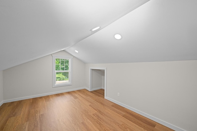 220 N Cedar St, Waterman, IL 60556 - additional living space with light wood-type flooring, lofted ceiling, and recessed lighting