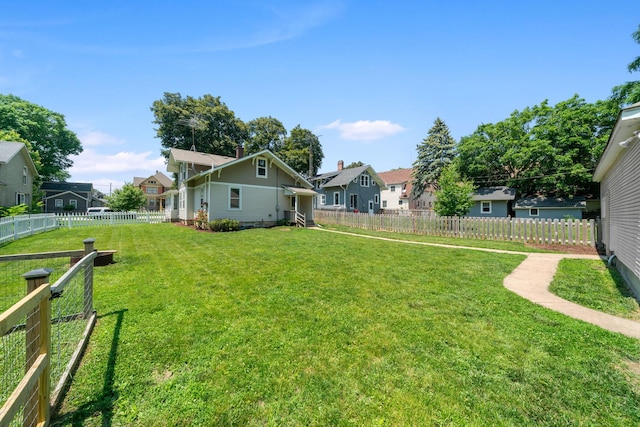 220 N Cedar St, Waterman, IL 60556 - fenced backyard with a residential view