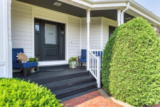 26 Carriage House Ln, Orland Park, IL 60467 - view of exterior entry with a porch