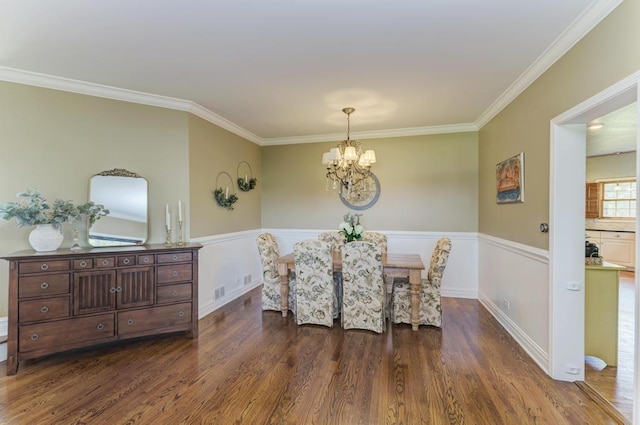 26 Carriage House Ln, Orland Park, IL 60467 - dining room featuring a chandelier, dark wood-style flooring, and ornamental molding