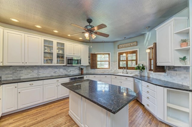 26 Carriage House Ln, Orland Park, IL 60467 - kitchen with appliances with stainless steel finishes, open shelves, white cabinetry, and recessed lighting