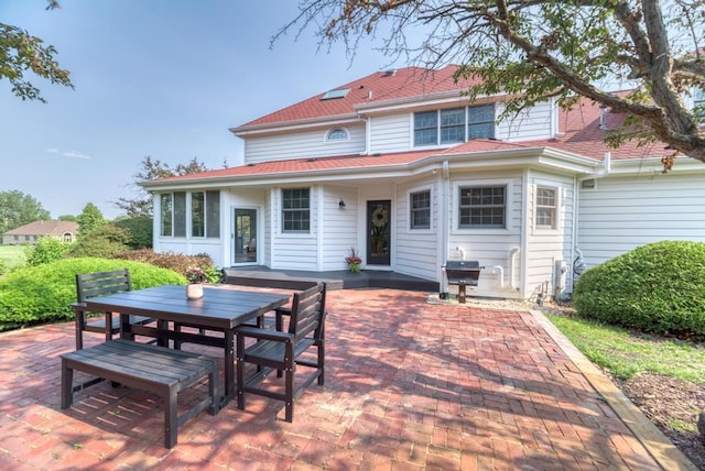 26 Carriage House Ln, Orland Park, IL 60467 - back of property with a patio area and outdoor dining space