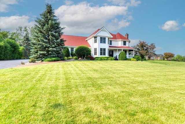 26 Carriage House Ln, Orland Park, IL 60467 - victorian house featuring a chimney and a front lawn