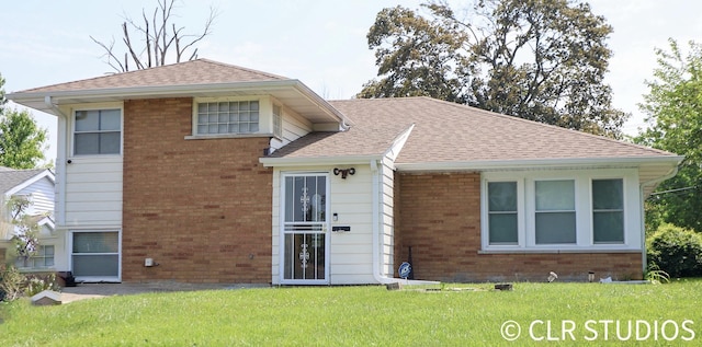 17405 Longfellow Ave, Hazel Crest, IL 60429 - back of property with brick siding, a lawn, and a shingled roof