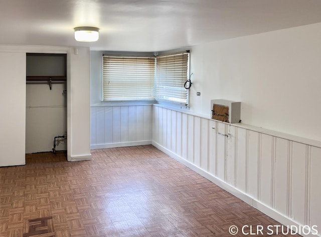 17405 Longfellow Ave, Hazel Crest, IL 60429 - unfurnished bedroom featuring a closet and wainscoting