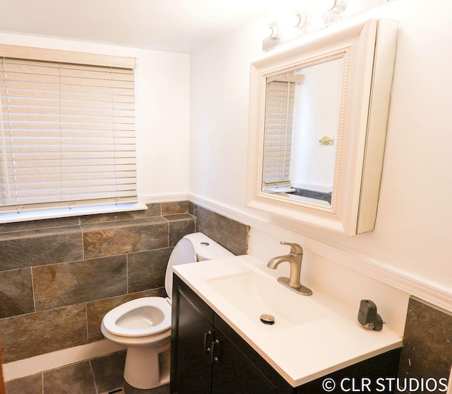 17405 Longfellow Ave, Hazel Crest, IL 60429 - bathroom featuring vanity, a wainscoted wall, and tile walls