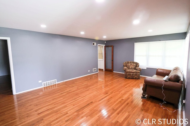 17405 Longfellow Ave, Hazel Crest, IL 60429 - living room with light wood-style flooring and recessed lighting