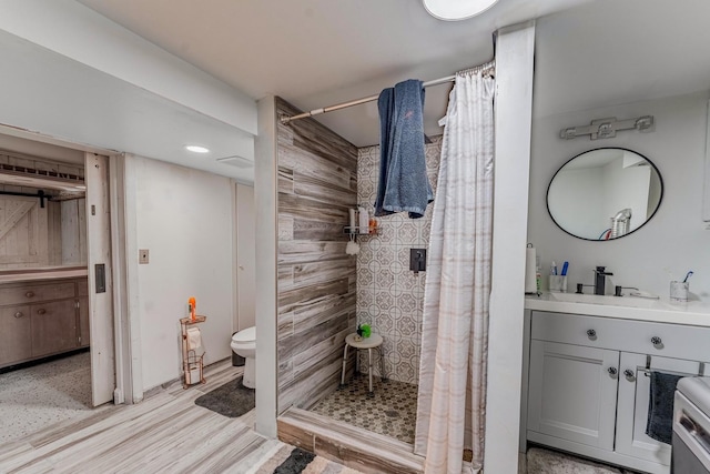 1820 Maple Ave, Berwyn, IL 60402 - full bathroom featuring vanity, tiled shower, and wood finished floors