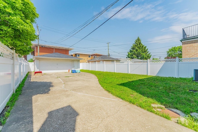 1820 Maple Ave, Berwyn, IL 60402 - view of yard with a detached garage and an outbuilding