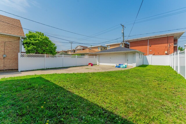 1820 Maple Ave, Berwyn, IL 60402 - fenced backyard featuring a garage, a patio, and an outbuilding