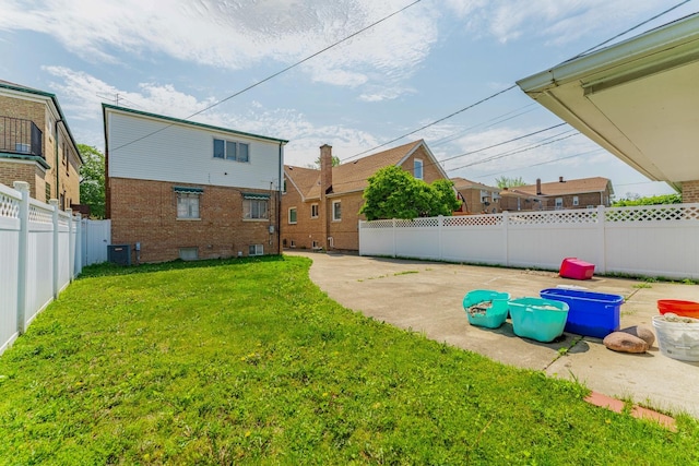 1820 Maple Ave, Berwyn, IL 60402 - fenced backyard with a patio area