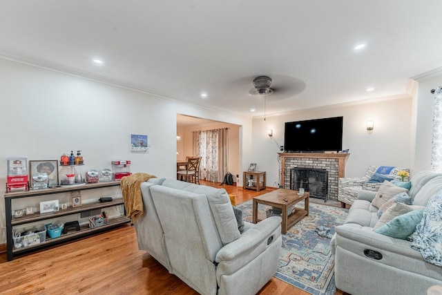 1820 Maple Ave, Berwyn, IL 60402 - living area with crown molding, ceiling fan, wood finished floors, recessed lighting, and a fireplace
