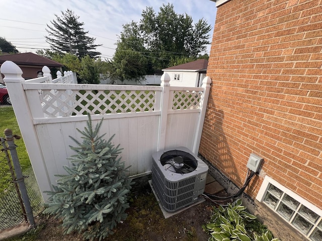 11133 Boeger Ct, Westchester, IL 60154 - exterior view of a cooling unit and brick siding