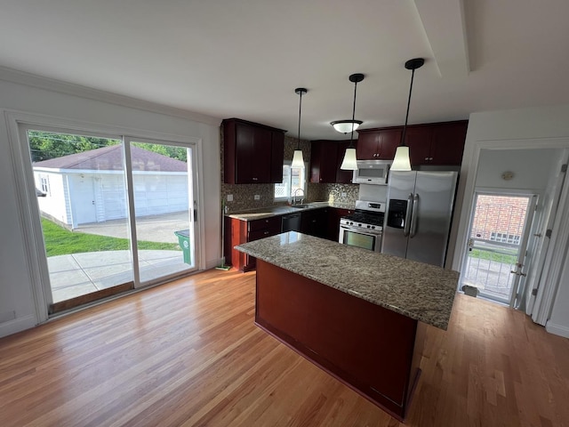 11133 Boeger Ct, Westchester, IL 60154 - kitchen with stainless steel appliances, light wood-style flooring, backsplash, and healthy amount of natural light
