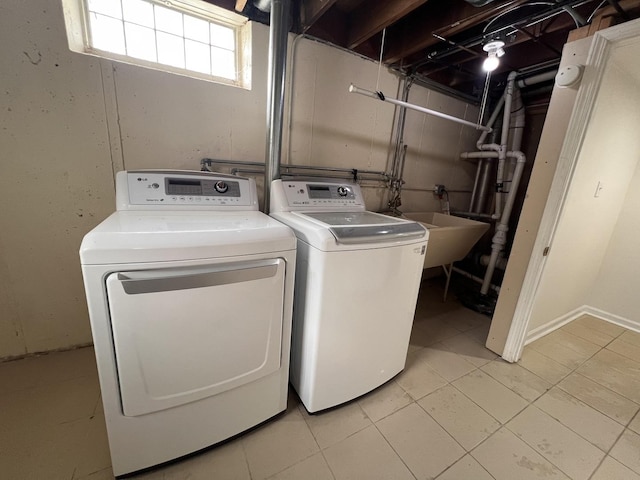 11133 Boeger Ct, Westchester, IL 60154 - laundry room featuring independent washer and dryer and light tile patterned floors