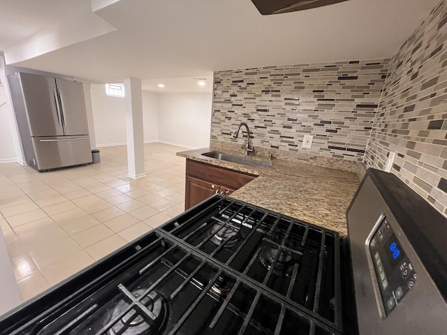11133 Boeger Ct, Westchester, IL 60154 - kitchen with freestanding refrigerator, light tile patterned flooring, light stone countertops, and backsplash