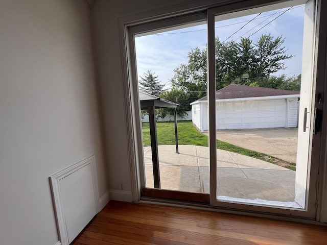 11133 Boeger Ct, Westchester, IL 60154 - doorway with baseboards and wood finished floors
