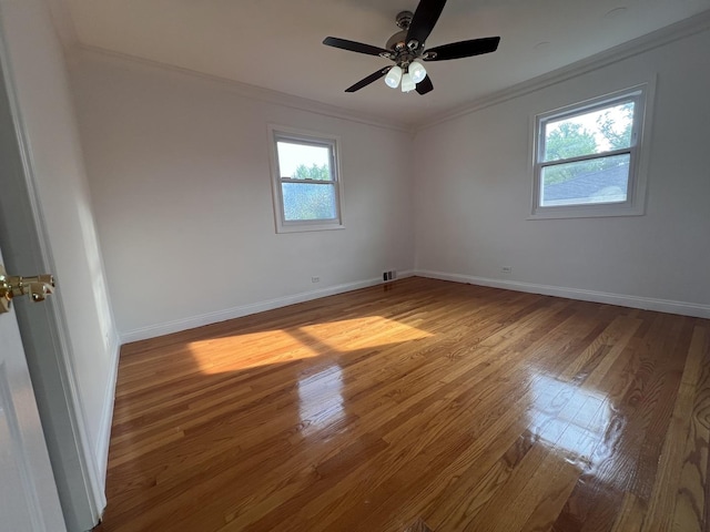 11133 Boeger Ct, Westchester, IL 60154 - unfurnished room featuring crown molding, wood finished floors, and ceiling fan
